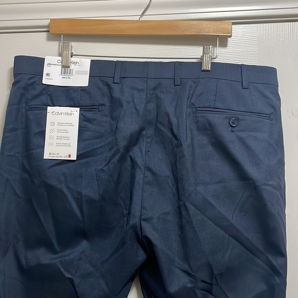 Calvin Klein pant Mens Navy slim wrinkle resistant stretch bottom New Sz 42Wx30L - Picture 6 of 10